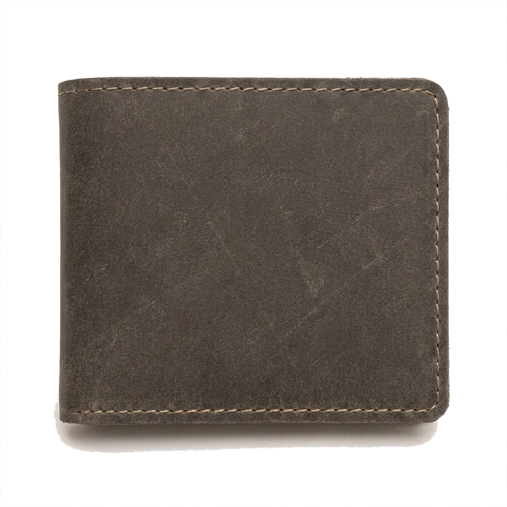 The Foreman folded closed in dark grey-brown Crazy Horse leather with pale contrast stitching