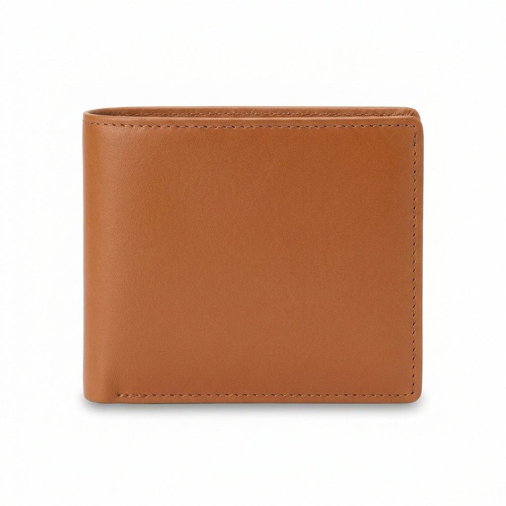 The Saddle folded closed in smooth tan finished leather with tonal stitching